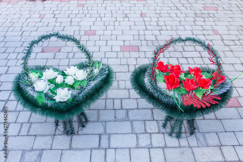 Memorial wreaths of artificial flowers photo