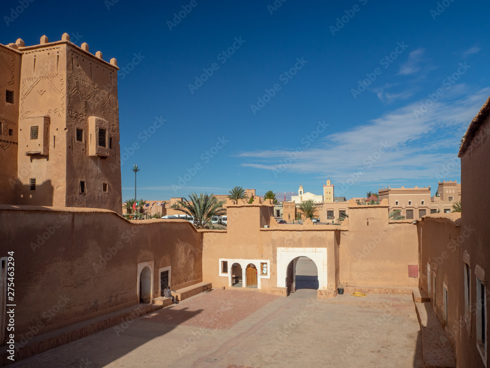 Taourirt Kasbah, Ouarzazate, Morocco, North Africa [Moroccan mountain landscape, old ancient Taourirt Kasbah castle fortress, street and buildings with kids and market]