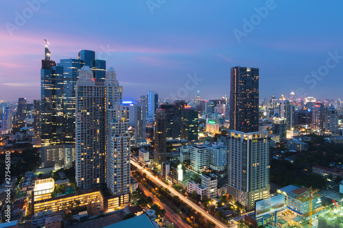 Modern building in Bangkok business district at Bangkok city with skyline at twilight, Thailand. © ake1150