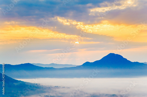 Mountainous landscape with golden sky and beautiful mist,Phu Tho Chiang Khan,Loei.