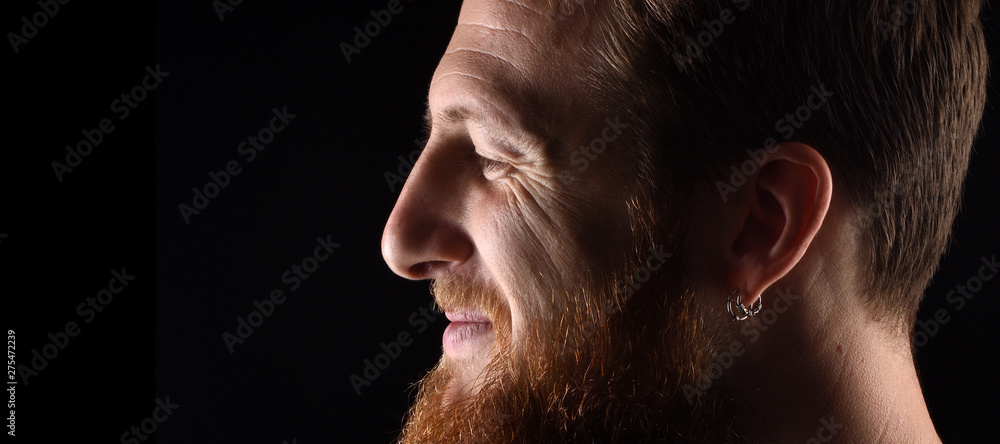 detail of the face of a man in his early thirties detail of the face of a man in his early thirties