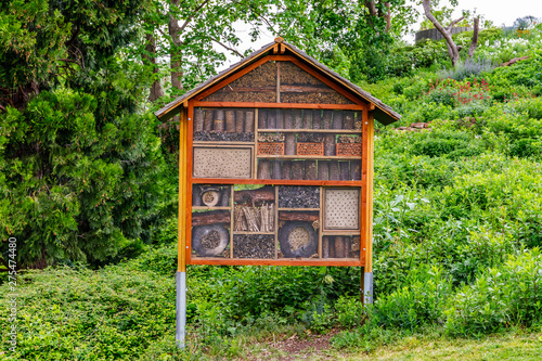 Huge insect house in green garden , copy space, text place  © nnattalli