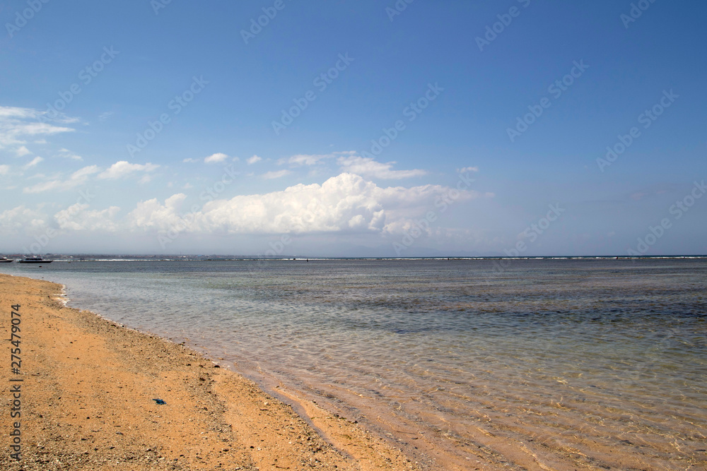 Sanur beach on a sunny day. Sanur is a resort town on Bali in Indonesia