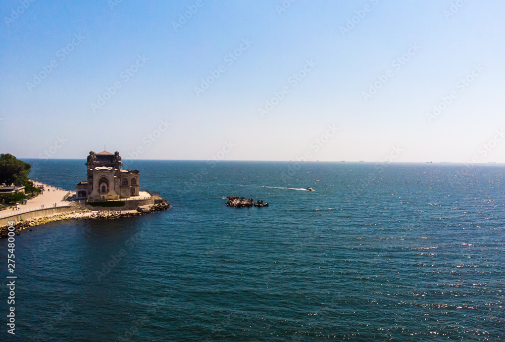 Aerial view of old Casino building in Constanta by the black sea. This building is a most reprezentativ symbol of town. Aerial view of old Casino building in Constanta by the black sea. This building is a most reprezentativ symbol of town.