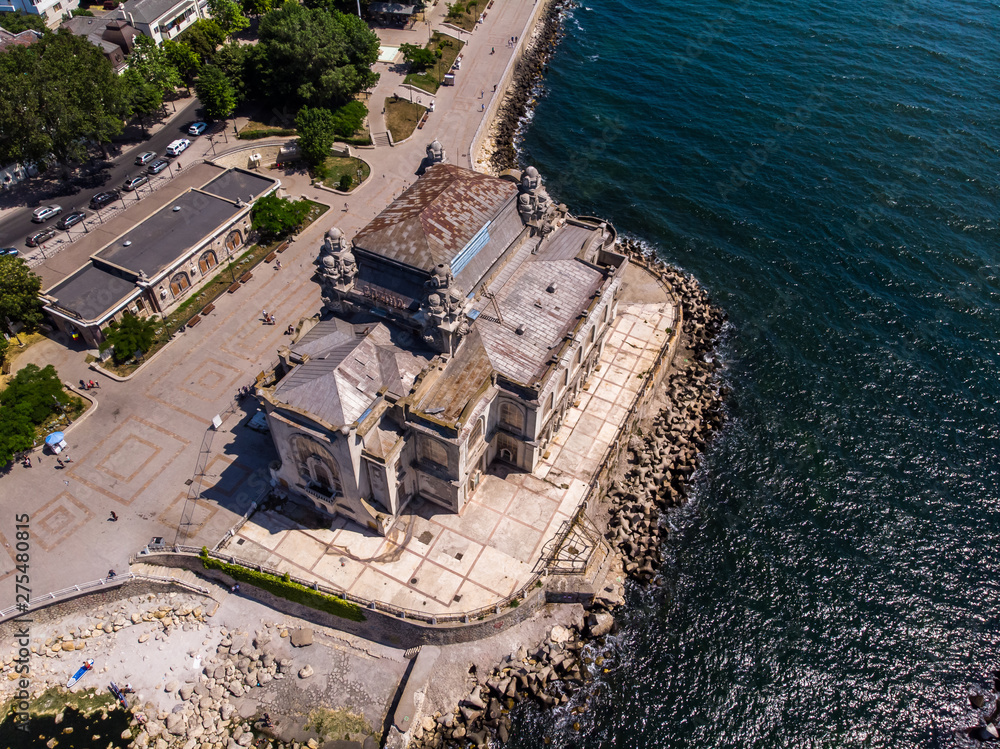 Aerial view of old Casino building in Constanta by the black sea. This building is a most reprezentativ symbol of town. Aerial view of old Casino building in Constanta by the black sea. This building is a most reprezentativ symbol of town.