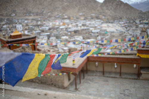 Buddhist Tibetan prayer flag colorful flag different in five color different meaning, Leh Ladakh, India on background of Himalaya mountain.