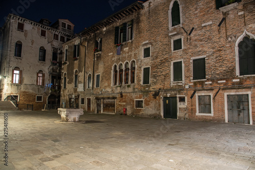 Night photography of the Campo Santa Maria Mater Domini in Venice, Italy. Small "field" in the Santa Croce district with the classic types of Venetian Renaissance buildings. Typical square