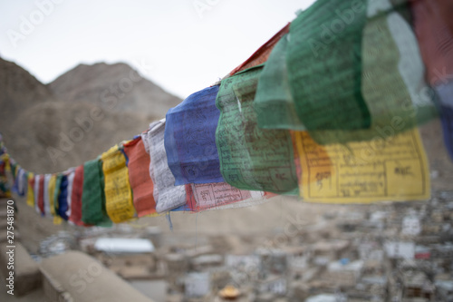 Buddhist Tibetan prayer flag colorful flag different in five color different meaning, Leh Ladakh, India on background of Himalaya mountain.