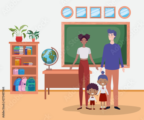 teacher couple with little students kids in the classroom