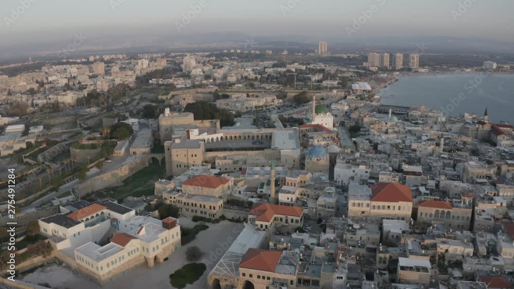Drone flies over Crusader City. Akkon as the destination of many cruise ships shines with its beautiful old town Drone flies over Crusader City. Akkon as the destination of many cruise ships shines with its beautiful old town
