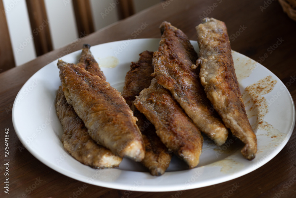 Several fried fillet mackerels on plate Several fried fillet mackerels on plate