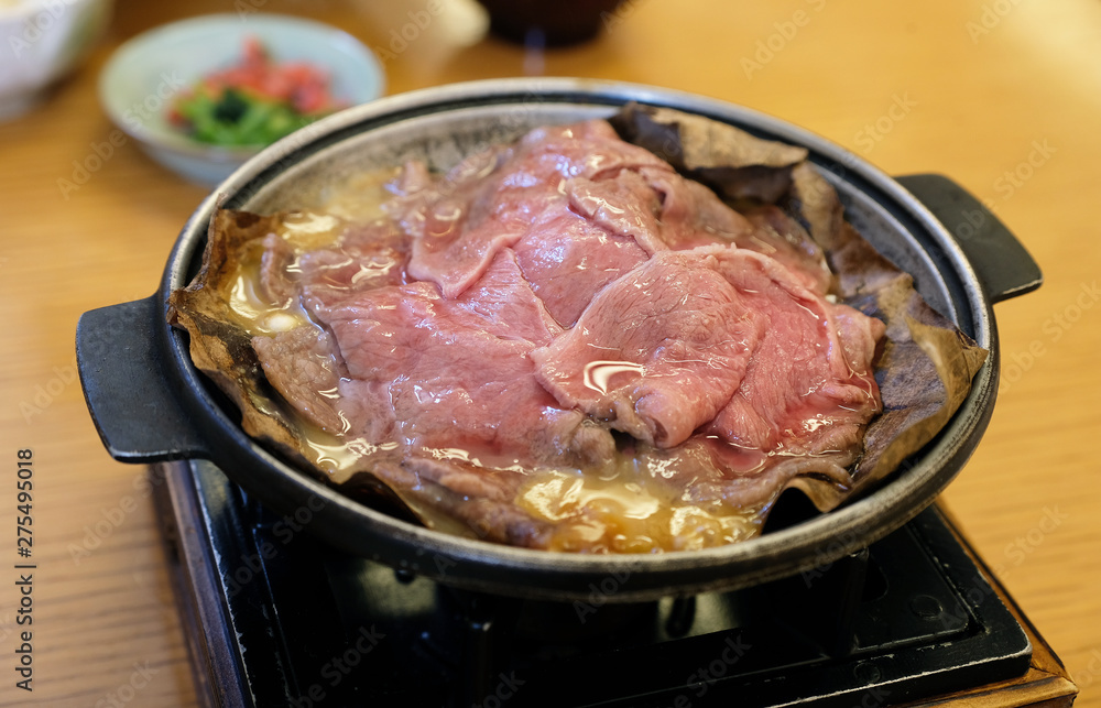 hida beef with hoba leaf on hot pot hida beef with hoba leaf on hot pot