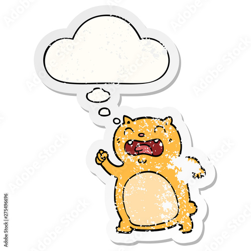 cartoon cat and thought bubble as a distressed worn sticker