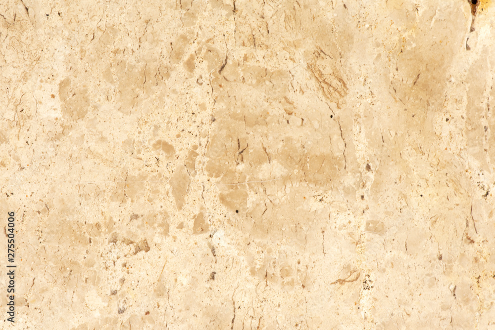 Golden marble texture of a natural white and golden stone tile.