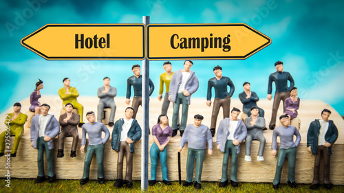 Street Sign to Camping versus Hotel