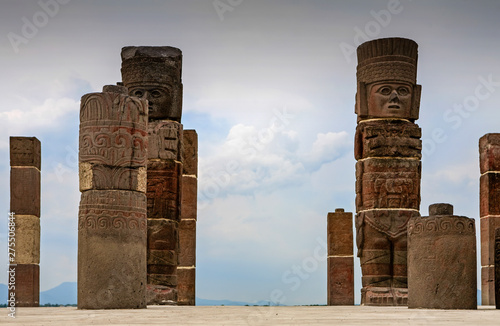 stone carved toltec empire totems pillars monuments on top of a pyramid in tula mexico