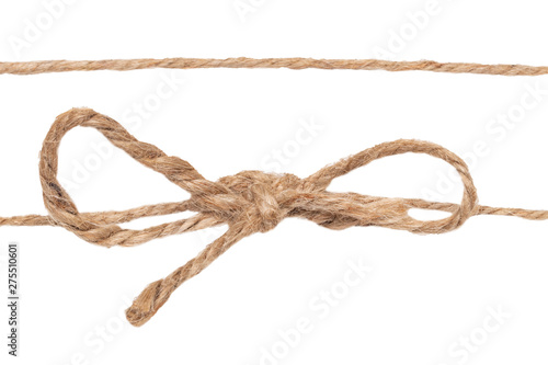 Closeup of twine node or knot with bow and one rope isolated on a white background. Decoration background.