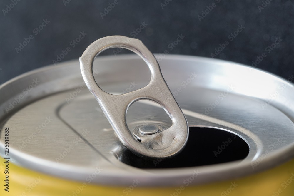 Open aluminum can of drink. Recycling used metal packaging. Ecology protection. Open aluminum can of drink. Recycling used metal packaging. Ecology protection.