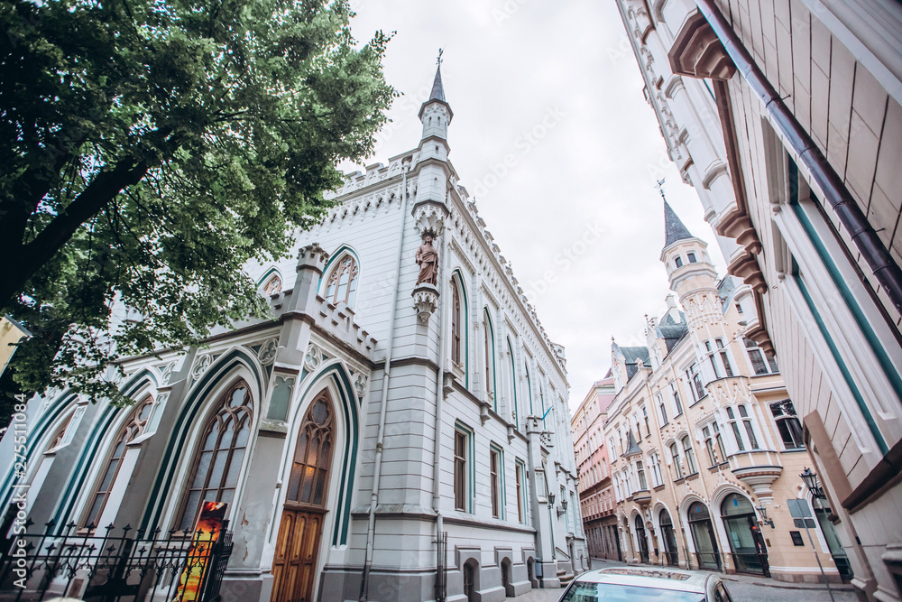Obraz premium Narrow medieval street in the old town of Riga, Latvia. Architectural monuments on old Riga.