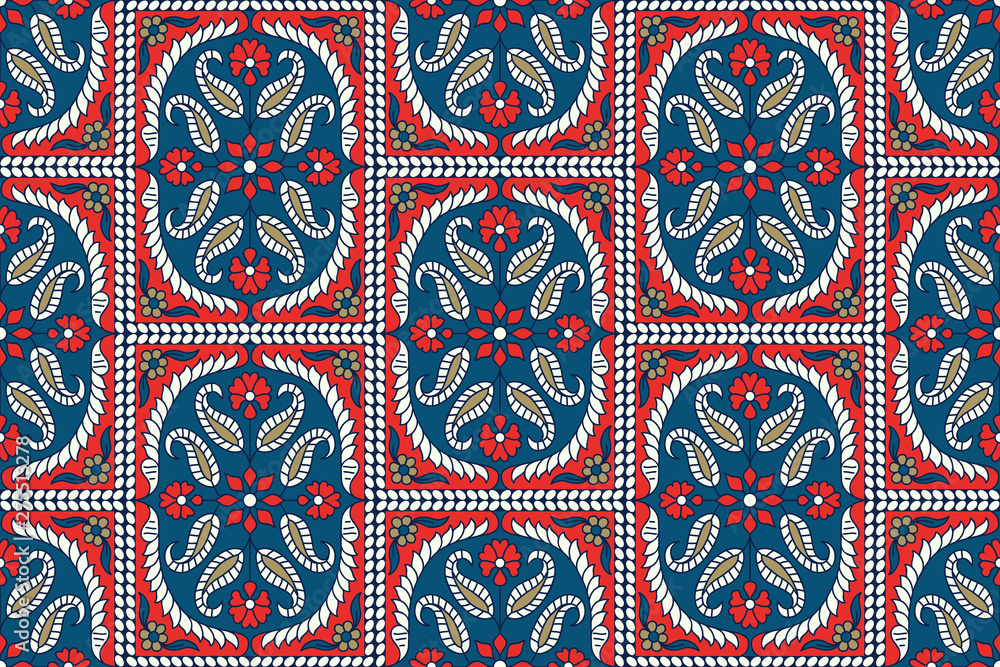 Woodblock printed indigo dye seamless ethnic floral paisley pattern. Traditional oriental ornament of India, damask motif, golden, ecru and red on blue background. Textile design.