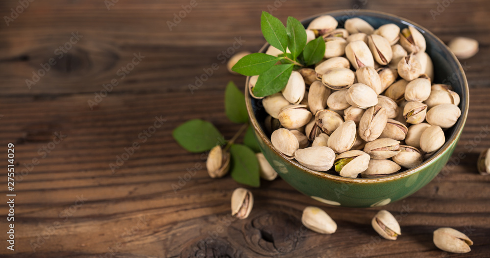 Pistachio nuts in the bowl Pistachio nuts in the bowl