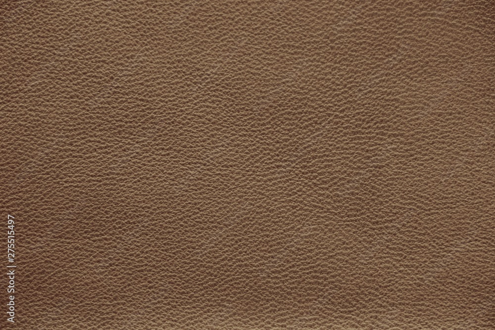 The texture of genuine leather. Impeccable and stylish background. Beautiful stylish background. Natural skin texture close up. Brown background. The structure of the leather material brown shades. The texture of genuine leather. Impeccable and stylish background. Beautiful stylish background. Natural skin texture close up. Brown background. The structure of the leather material brown shades.