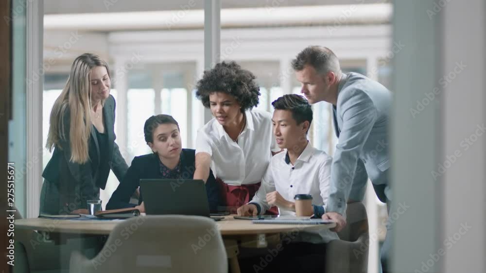 business people brainstorming using laptop computer team leader woman pointing at screen sharing creative ideas helping colleagues discussing project teamwork in modern office 4k