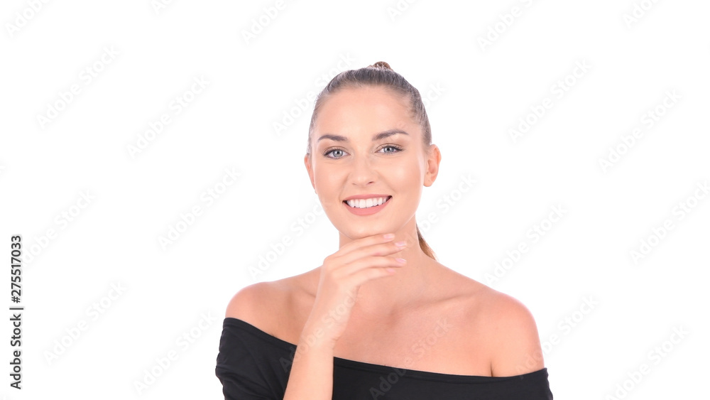 Beauty concept. A beautiful girl is fondling her face on a white background. Beauty concept. A beautiful girl is fondling her face on a white background.