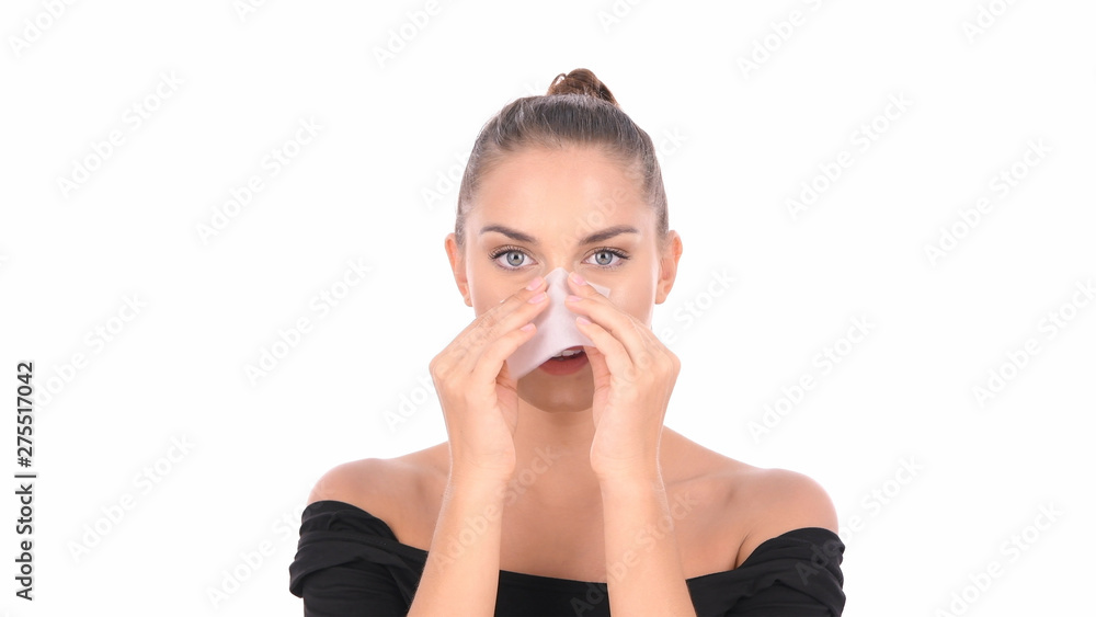 Beauty concept. Skin Care. Woman Removing Oil From Face Using Blotting Papers. Beauty concept. Skin Care. Woman Removing Oil From Face Using Blotting Papers.
