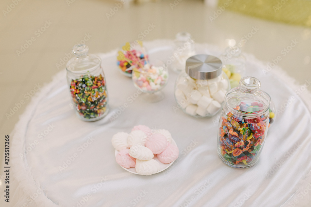 Sweet dessert table at a wedding.Cakestand at a wedding Sweet dessert table at a wedding.Cakestand at a wedding