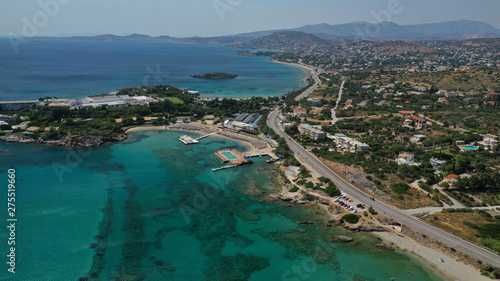 Aerial panoramic view of famous Grand Resort Lagonisi or Lagonissi paradise peninsula and beach with pool facilities in exotic peninsula, Athens riviera, Attica, Greece