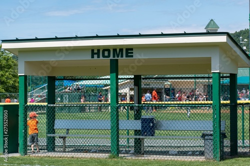 Baseball, softball, tball dugouts sit and await the players to come and start their game.