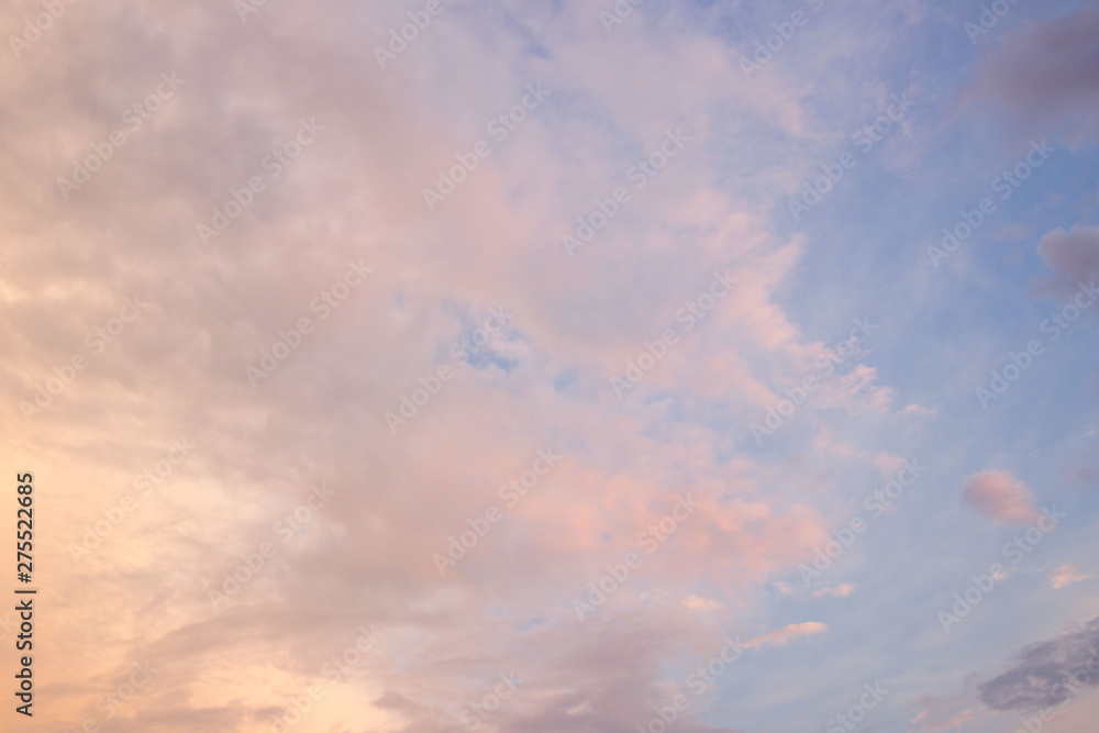 the sky with gentle clouds of pink shade, colored by the setting sun. the sky with gentle clouds of pink shade, colored by the setting sun.