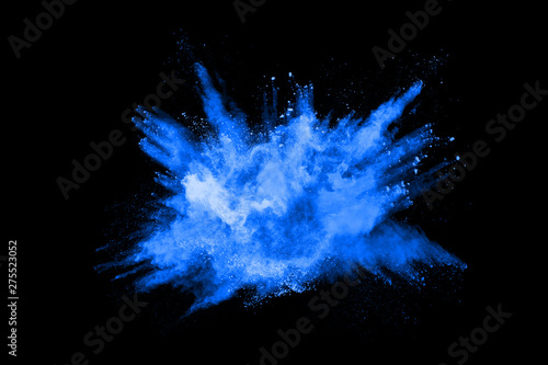 abstract blue powder splatted background,Freeze motion of color powder exploding/throwing color powder,color glitter texture on black background.