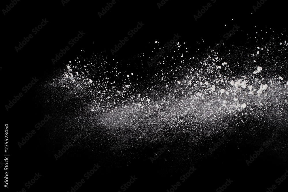 White powder explosion on black background. Colored cloud. Colorful dust explode. Paint Holi. White powder explosion on black background. Colored cloud. Colorful dust explode. Paint Holi.