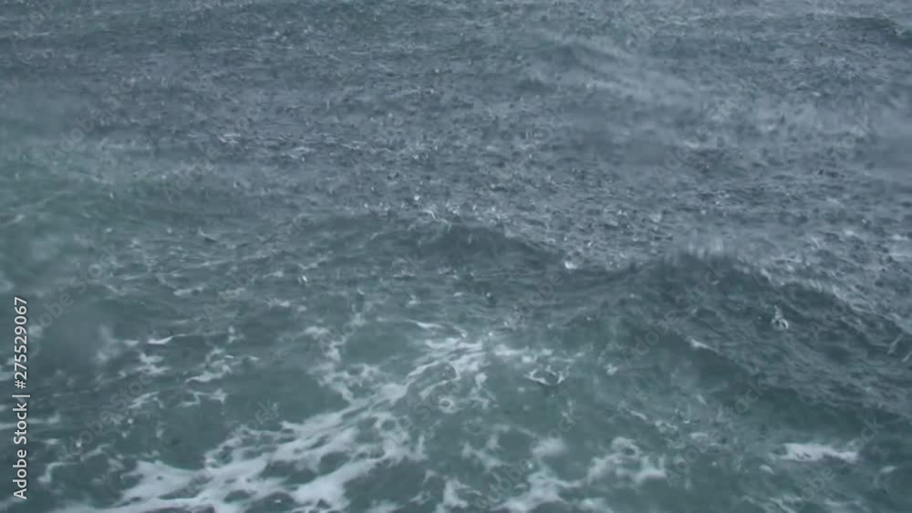 Heavy rain on the sea surface, close-up. Heavy rain on the sea surface, close-up.