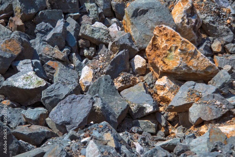 The texture of large stones in a quarry for the extraction of stone. The texture of large stones in a quarry for the extraction of stone.