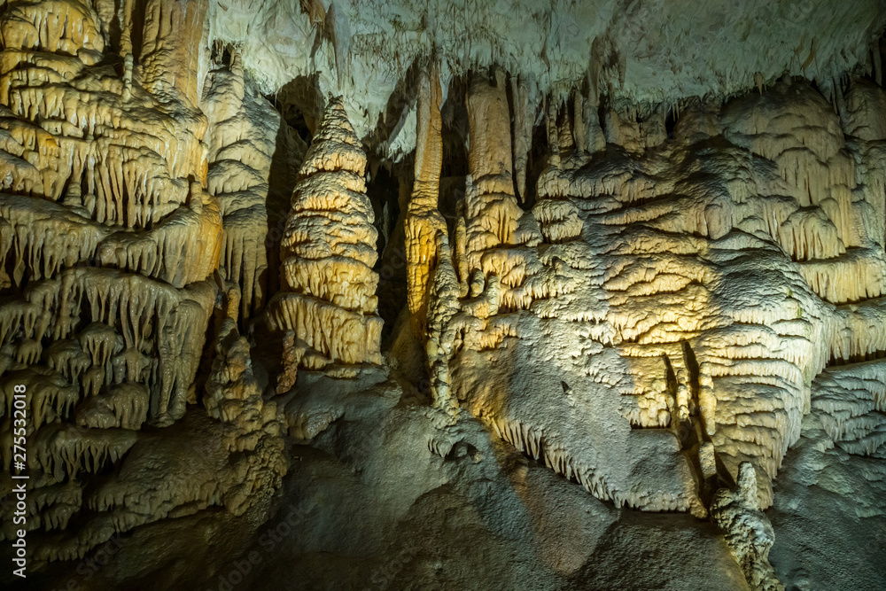 Stalactites and stalagmites underground in cave system in Postojna