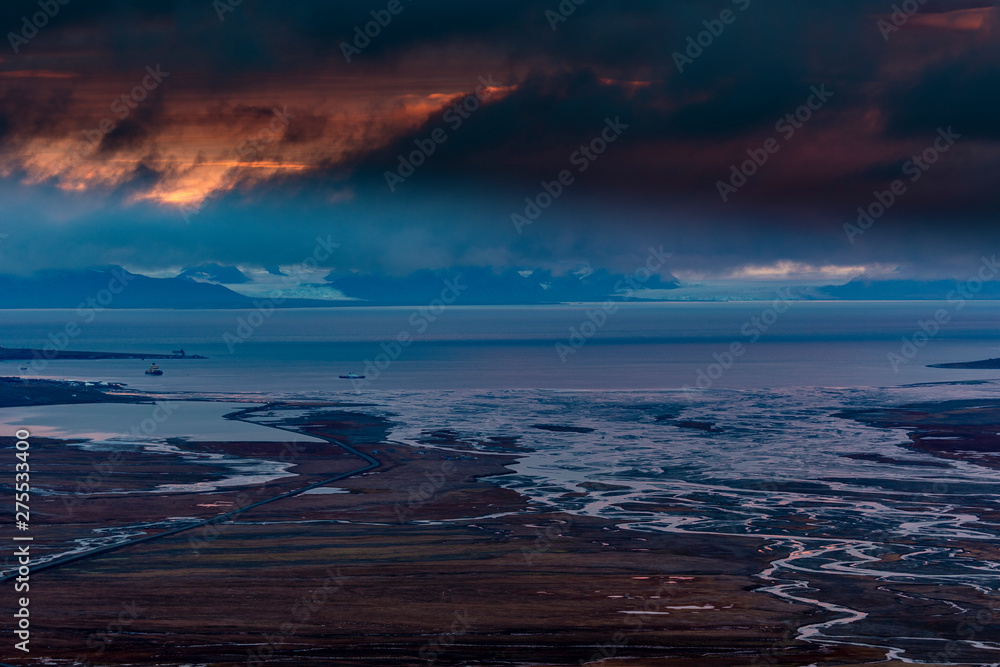 Fototapeta premium View over beautiful Adventdalen from above coal mine number 7, sunset, the arctic tundra of Svalbard or Spitsbergen, northern Norway