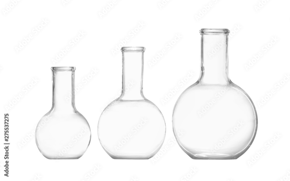 Empty Florence flasks on white background. Chemistry glassware Empty Florence flasks on white background. Chemistry glassware