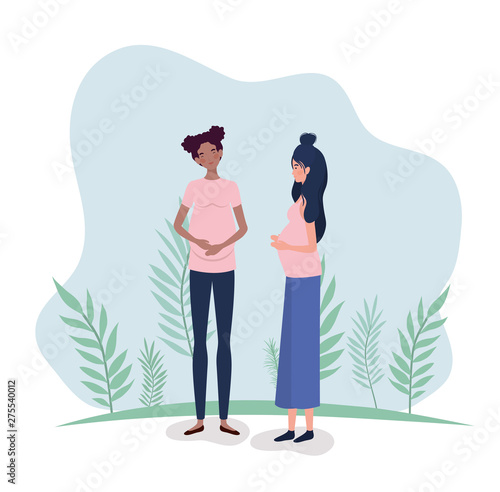 cute interracial women pregnancy in the landscape