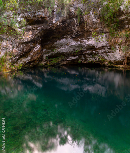 Cenote Zaci - Valladolid  Mexico  is a natural sinkhole  resulting from the collapse of limestone bedrock that exposes groundwater underneath