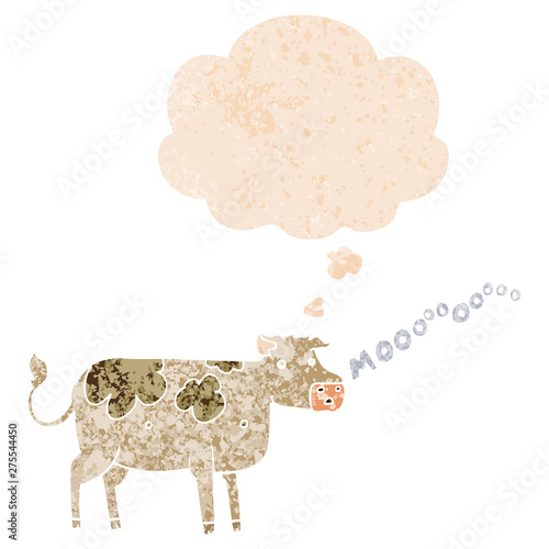 cartoon cow and thought bubble in retro textured style