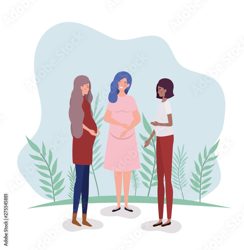 cute interracial women pregnancy in the landscape