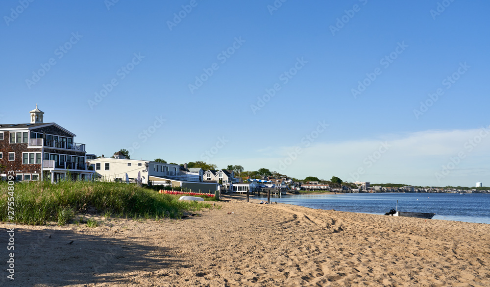 Looking along the shore from the beach at MacMillan Pier in Provincetown, Massachusetts