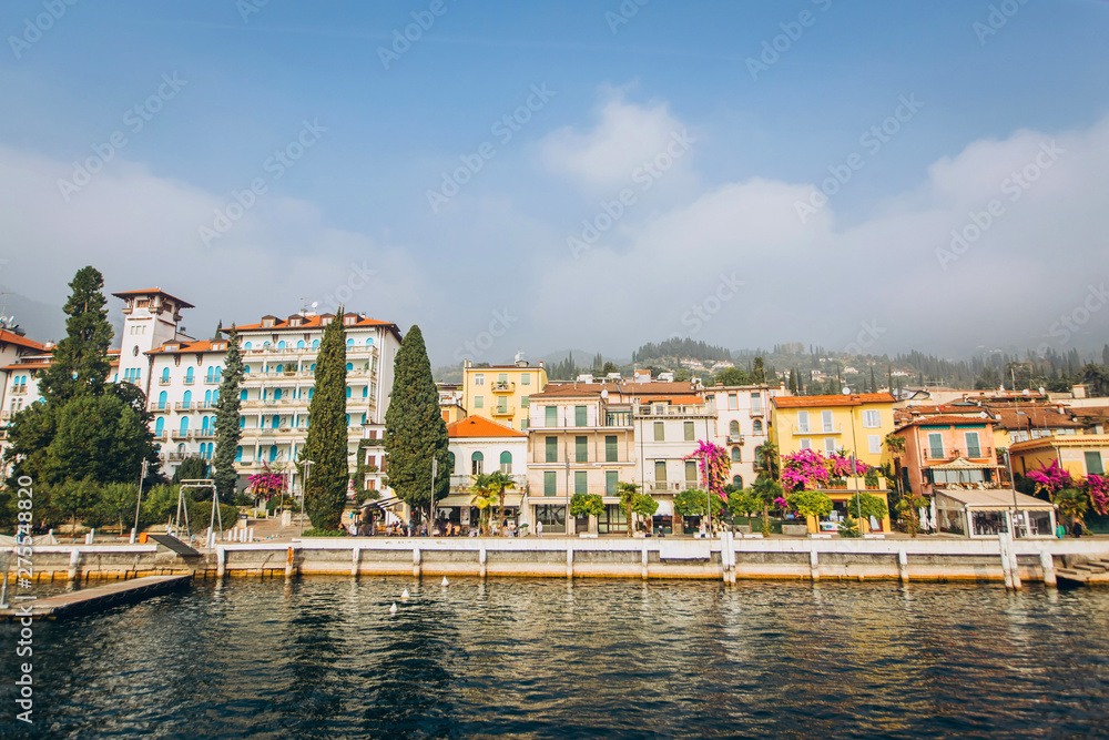 Beautiful panorama of Lake Garda Italy. View of the beautiful Lake Garda from a boat surrounded by mountains