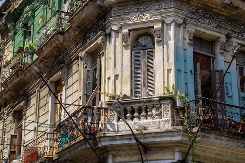 Exterior view of the residential buildings in the Old Havana City, Capital of Cuba, during a sunny day. © edb3_16