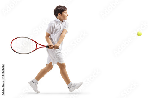 Boy tennis player hitting a ball © Ljupco Smokovski