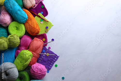 Composition with colorful yarn on light background