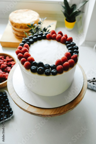 Delicious berry Cake with Fresh Raspberry and Blueberry